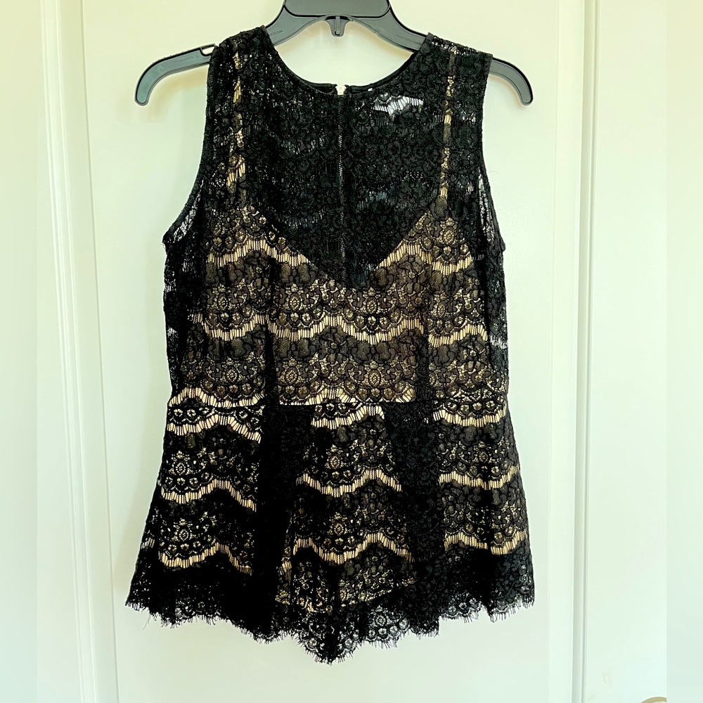 Brand New Never Worn black lace with under lining top. Very fashionable